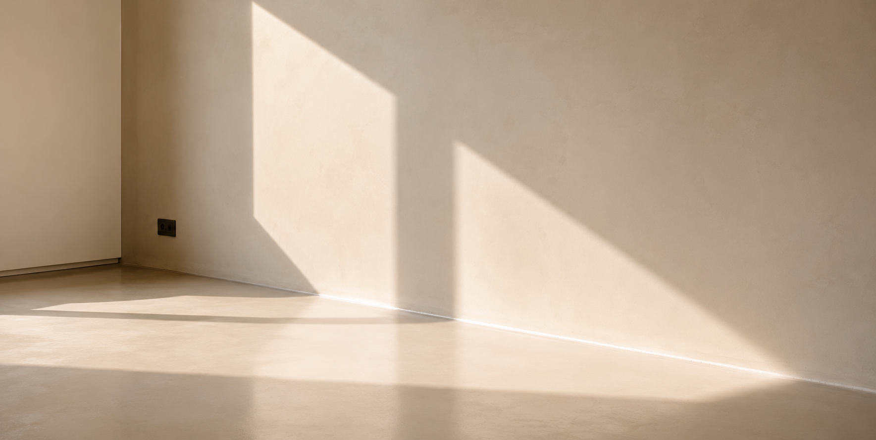 Seamless microcement surface flowing from wall to floor